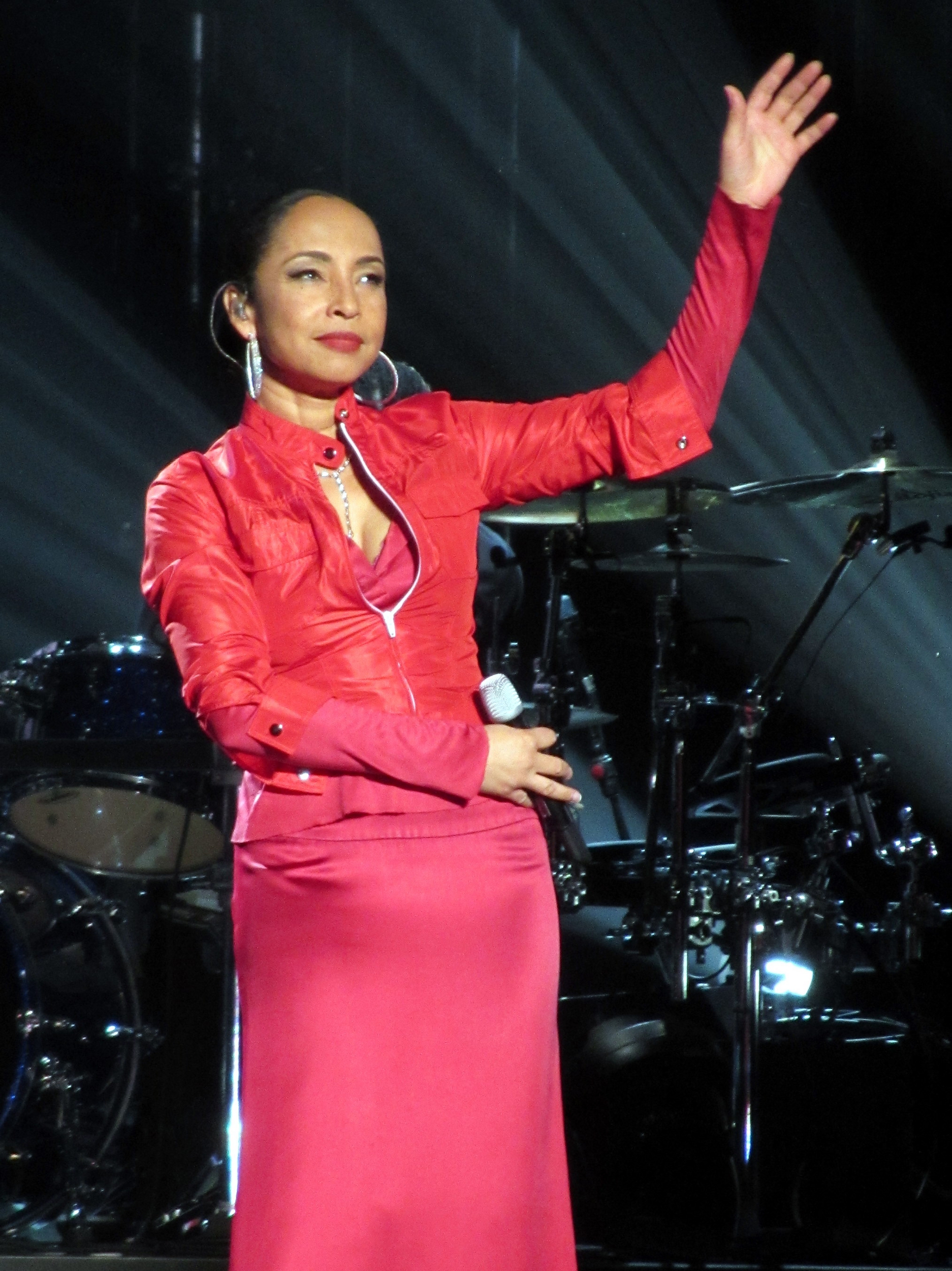 Sade Adu performing in 2011, a later photograph than the 1984 album featured in this edition.