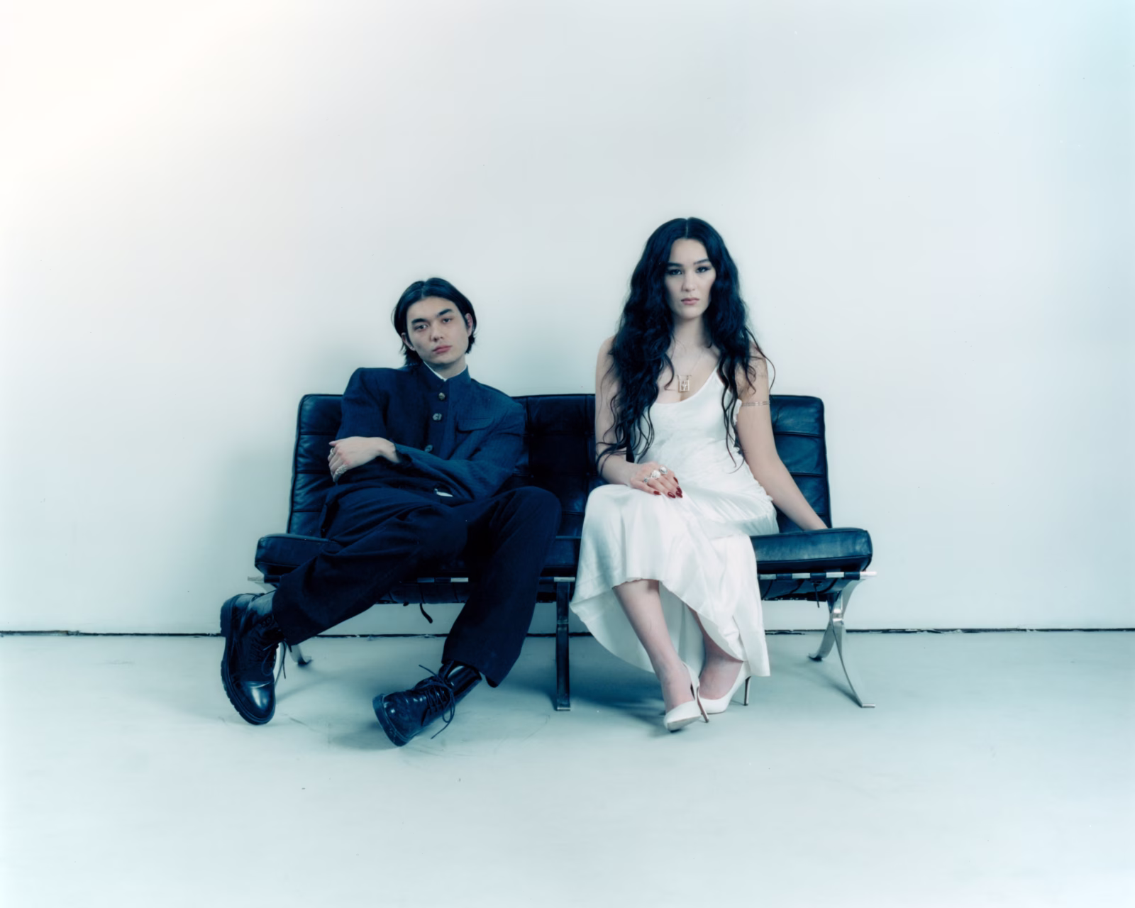 Will Gao and Olivia Hardy of Wasia Project seated together in a minimalist studio